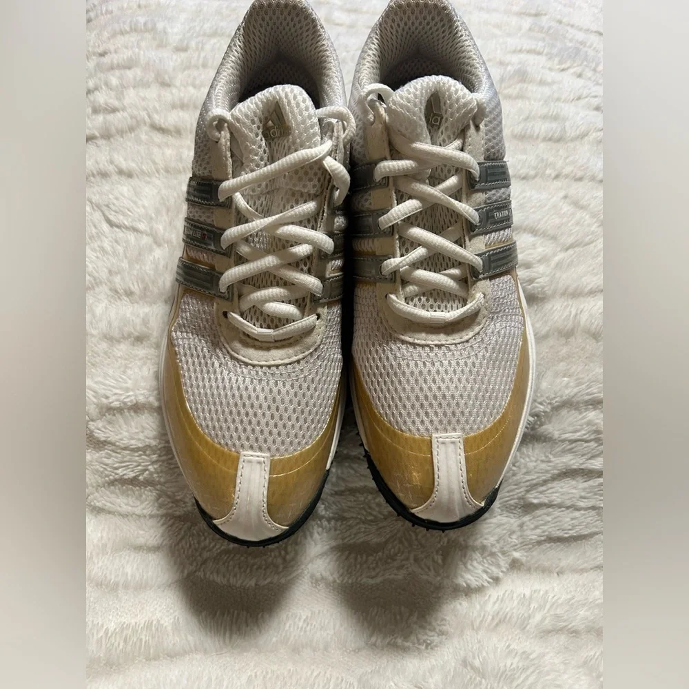 Adidas Traxion Lite S 50/50 Protect women's golf shoes.